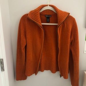 orange rubber doll zip up cardigan
